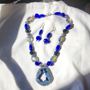 Stone,crystal,& glass beaded necklace with a  druzzy pendant.